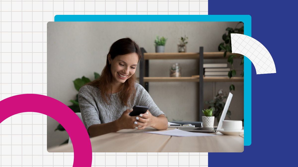 Woman looking at phone smiling happy marketing