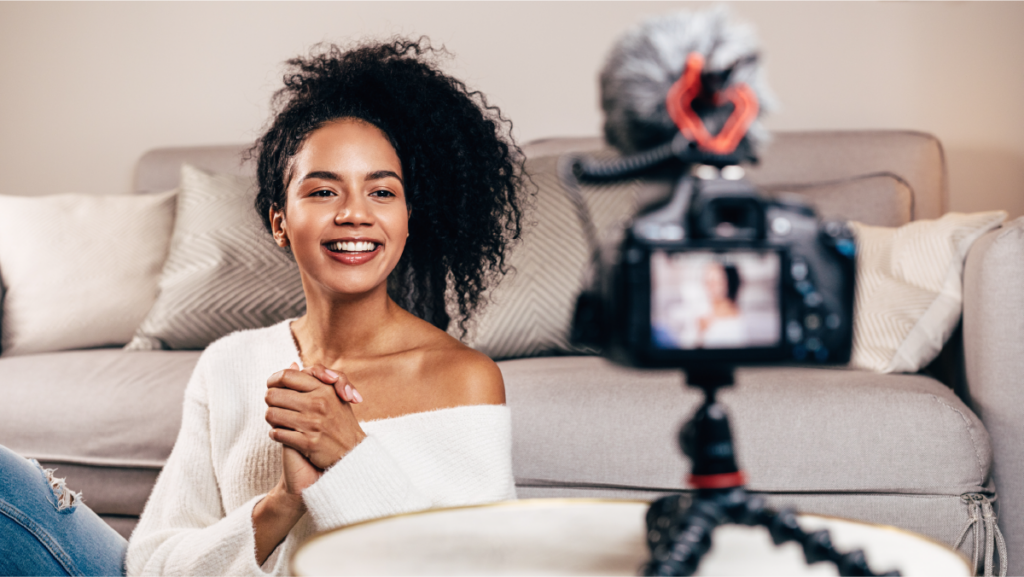 Woman with a camera on a tripod